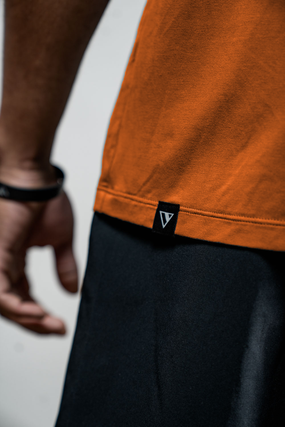 Men's Terra Recovery Polo (Sunfire Clay) Engineered with a structured yet flexible fit